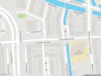 Ambulance met gepaste spoed naar de Vrijenhoefpolderweg in Gouda