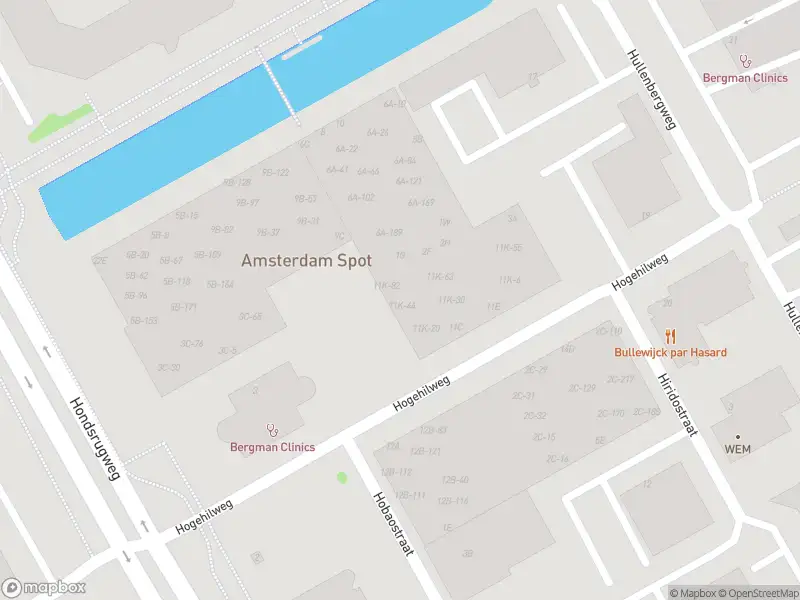 Brandweer met gepaste spoed naar de Herikerbergweg in Amsterdam vanwege afgaan automatisch brandalarm