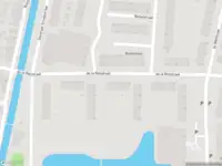Ambulance met grote spoed naar de De la Reijstraat in Ridderkerk