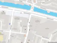 Ambulance met gepaste spoed naar de Spuiboulevard in Dordrecht