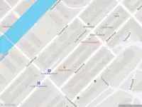 Ambulance met gepaste spoed naar de Eerste Coehoornstraat in Amsterdam