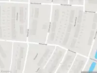 Ambulance met gepaste spoed naar de Dorpsweg in Rotterdam