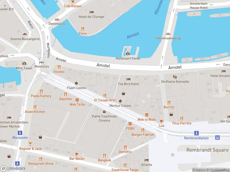 Ambulance met gepaste spoed naar de Regulierssteeg in Amsterdam