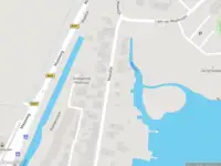 Ambulance met grote spoed naar de Maasdijk in Mijnsheerenland
