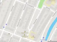 Ambulance met gepaste spoed naar de De Quackstraat in Rotterdam