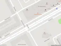 Ambulance met gepaste spoed naar de Karspeldreef in Amsterdam