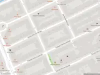 Ambulance met grote spoed naar de Alberdingk Thijmstraat in Amsterdam
