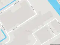 Ambulance met gepaste spoed naar de Mijestraat in Rotterdam