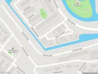 Ambulance met grote spoed naar de Rollemanstraat in Amsterdam