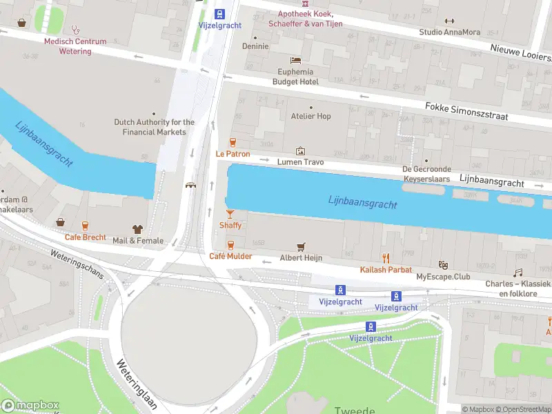 Ambulance met grote spoed naar de Den Texstraat in Amsterdam