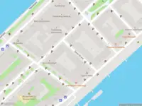 Ambulance met grote spoed naar de Oeverstraat in Rotterdam