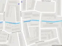 Ambulance met grote spoed naar de Jan van Zutphenstraat in Haarlem