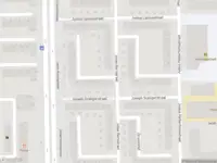 Ambulance met gepaste spoed naar de Albert Schultenshof in Amsterdam