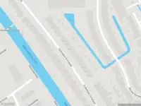 Ambulance met grote spoed naar de Oudedijkse Schiekade in Rotterdam