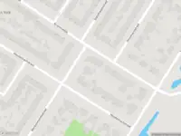 Ambulance met grote spoed naar de Krommedijk in Dordrecht