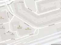 Ambulance met gepaste spoed naar de Stationssingel in Rotterdam