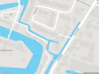 Ambulance met grote spoed naar de Rozenlaan in De Kwakel