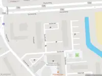 Ambulance met grote spoed naar de Spuikreek in Rotterdam