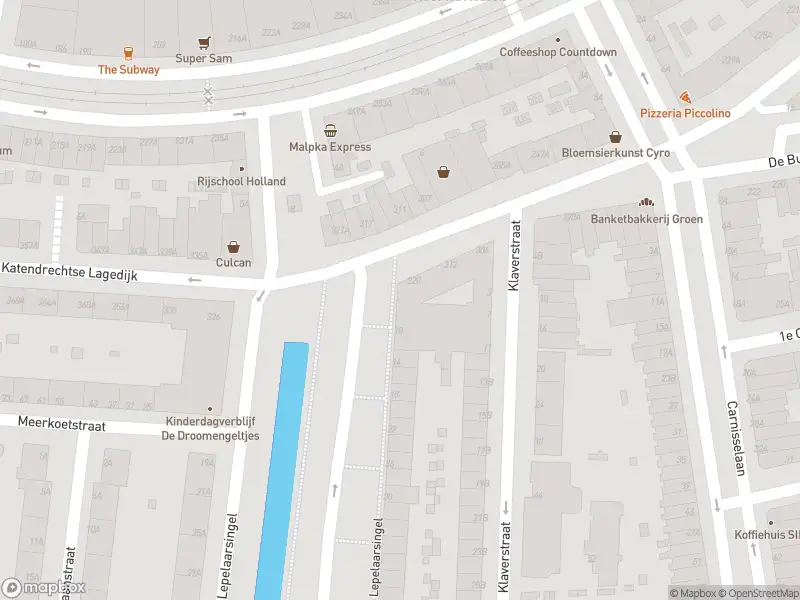 Ambulance met grote spoed naar de Lepelaarsingel in Rotterdam