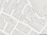 Ambulance met grote spoed naar de Vijverhof in Meerkerk