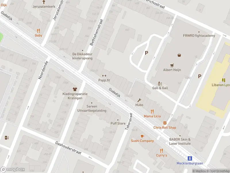 Ambulance met gepaste spoed naar de Oudedijk in Rotterdam