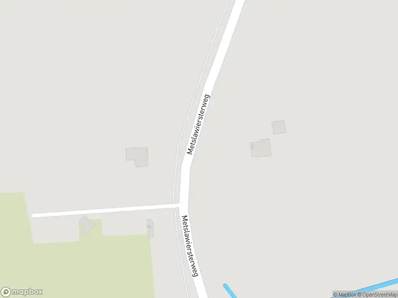 Politie met grote spoed naar de Metslawiersterweg in Dokkum vanwege voertuigen te water