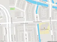 Ambulance met gepaste spoed naar de Vrijenhoefpolderweg in Gouda