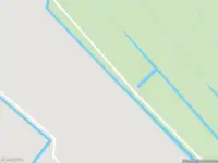 Ambulance met gepaste spoed naar de Zomerdijk in Spanbroek