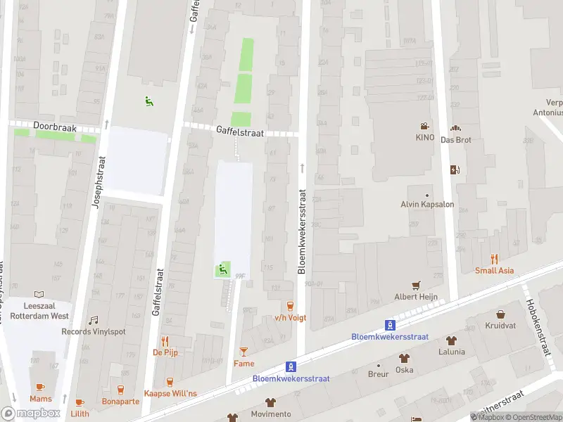 Ambulance met gepaste spoed naar de Bloemkwekersstraat in Rotterdam