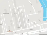 Ambulance met grote spoed naar de Stadionweg in Rotterdam