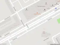 Ambulance met grote spoed naar de Karspeldreef in Amsterdam