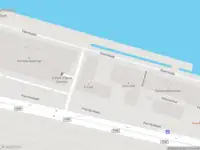 Ambulance met grote spoed naar de Jollemanhof in Amsterdam