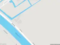 Ambulance met grote spoed naar de Delftweg in Rotterdam