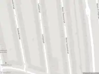 Ambulance met gepaste spoed naar de Lumeijstraat in Amsterdam