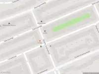 Ambulance met grote spoed naar de Okeghemstraat in Amsterdam