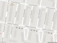 Ambulance met grote spoed naar de Du Perronstraat in Amsterdam