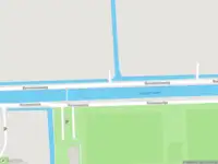 Politie naar de Beresteinseweg in 's-Graveland vanwege voertuigen te water