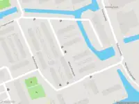 Ambulance met grote spoed naar de P.C. Boutenspad in Delft