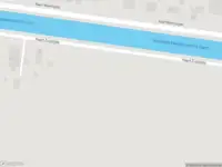 Politie met grote spoed naar de Dommerskanaal ZZ in Nieuw-Amsterdam vanwege voertuigen te water