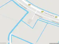 Ambulance met grote spoed naar de Groene Kruisweg Oost in Heenvliet