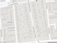 Ambulance met gepaste spoed naar de Burgemeester van Esstraat in Pernis Rotterdam