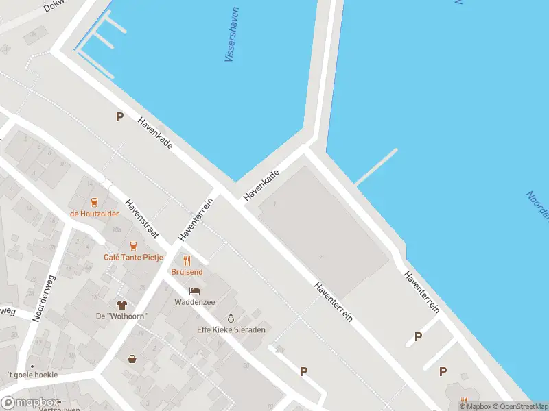 Ambulance en brandweer met grote spoed naar de Havenkade in Den Oever vanwege middelgrote brand