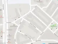 Ambulance met gepaste spoed naar de Eerste Tuinsingel in Schiedam