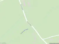 Brandweer en politie met grote spoed naar de Roovertsebaan in Esbeek vanwege waarnemen gaslucht