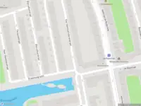 Ambulance met grote spoed naar de Vier Heemskinderenstraat in Amsterdam