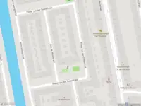 Ambulance met gepaste spoed naar de Pieter van der Doesstraat in Amsterdam