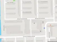 Ambulance met grote spoed naar de Adriaan Dorsmanstraat in Amsterdam