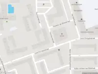 Ambulance met gepaste spoed naar de Tourniairestraat in Amsterdam