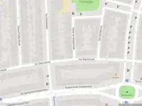 Ambulance met gepaste spoed naar de Pieter de Hooghstraat in Schiedam