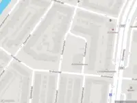 Ambulance met grote spoed naar de Slotboomplein in Rotterdam